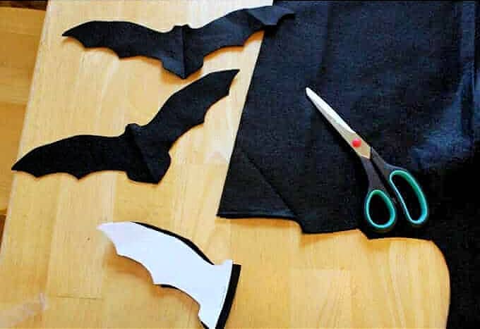 cutting out bats for garland