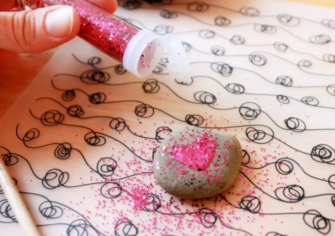 glitter heart on a rock