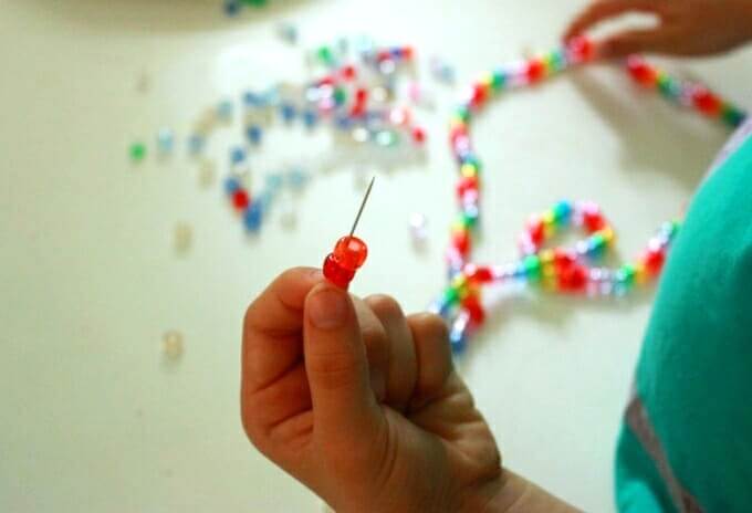 Stringing beads for melted bead art
