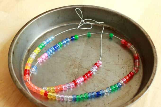 pony beads strung on wire for use in a melted bead art or mobile