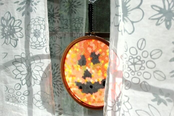 Melted Bead Halloween Suncatchers hanging in window