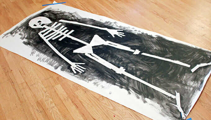 Tape Resist Skeleton Paintings – Remove tape when dry