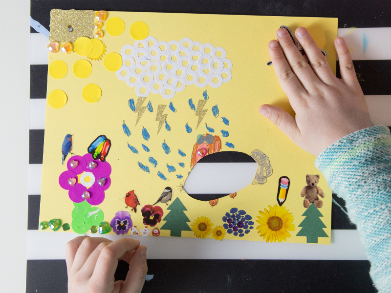 hole in paper with stickers