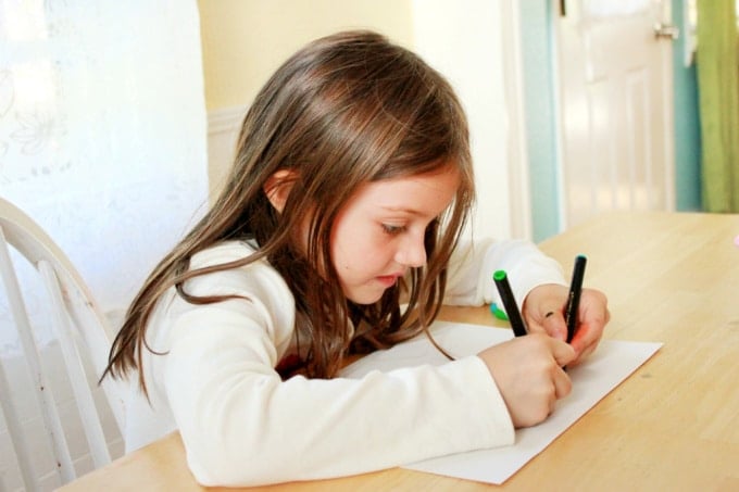girl doing double doodles