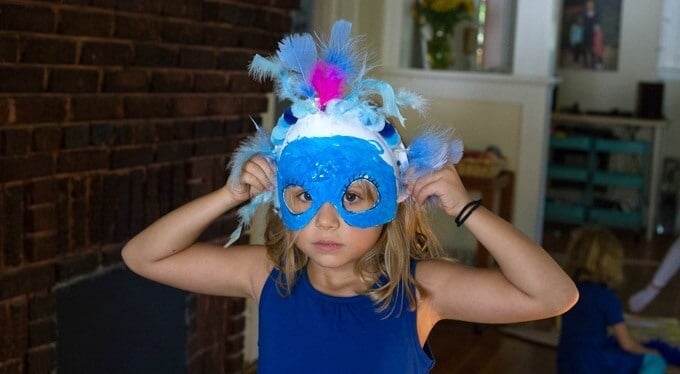 A paper plate mask for a bird costume