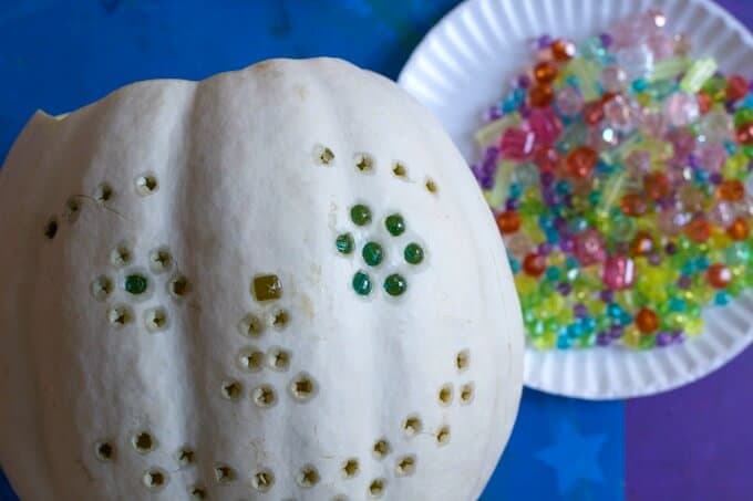 DIY Lite Brite Like Pumpkin - Poking Beads in Holes
