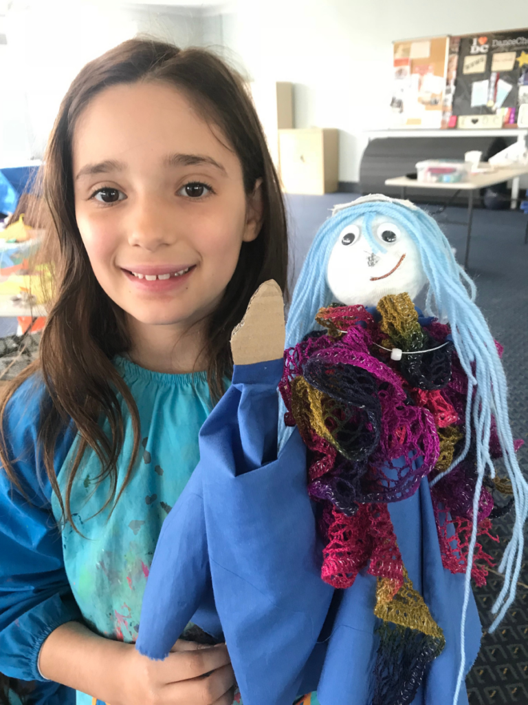 child with a puppet