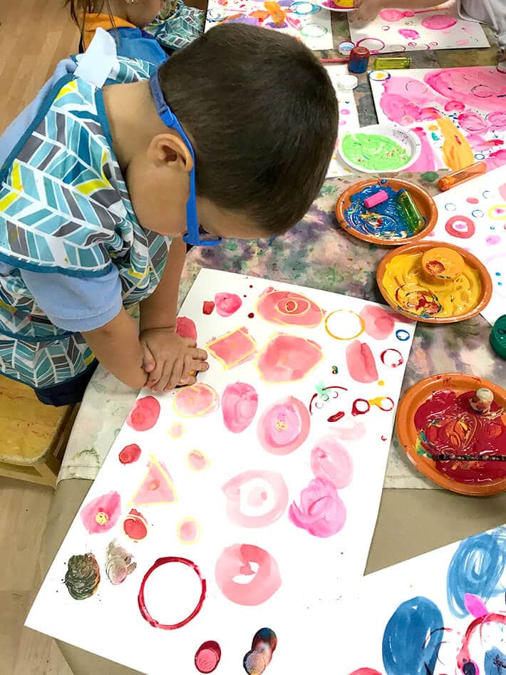 Boy looking at pink Yayoi Kusama Inspired Dot Painting