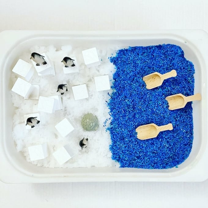 Penguin with snow and rice sensory bin_funincocoon