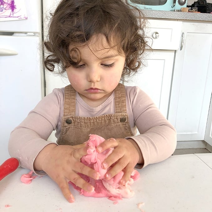 Child playing with playdough