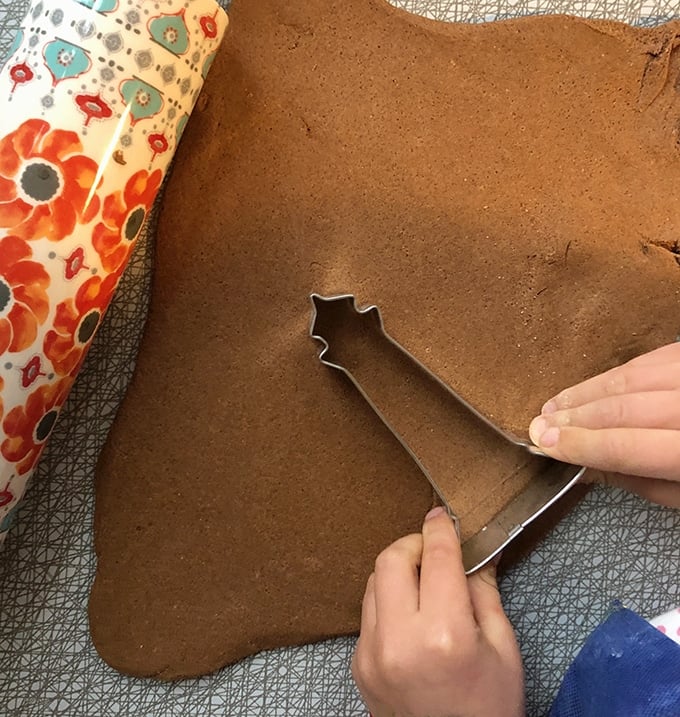cutting out cinnamon dough