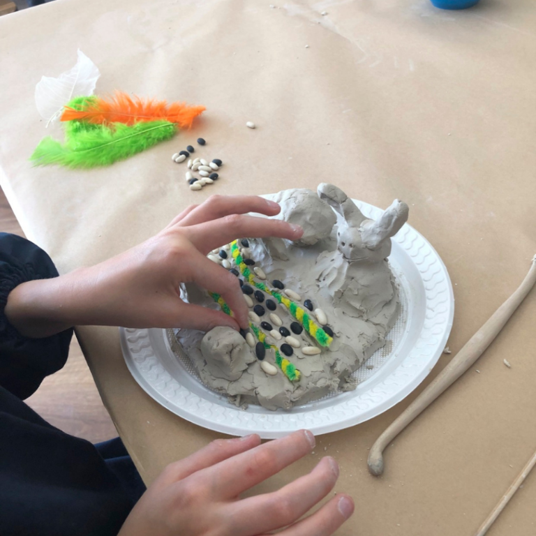 adding beans to clay