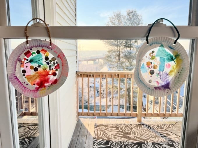 tissue paper suncatchers in window