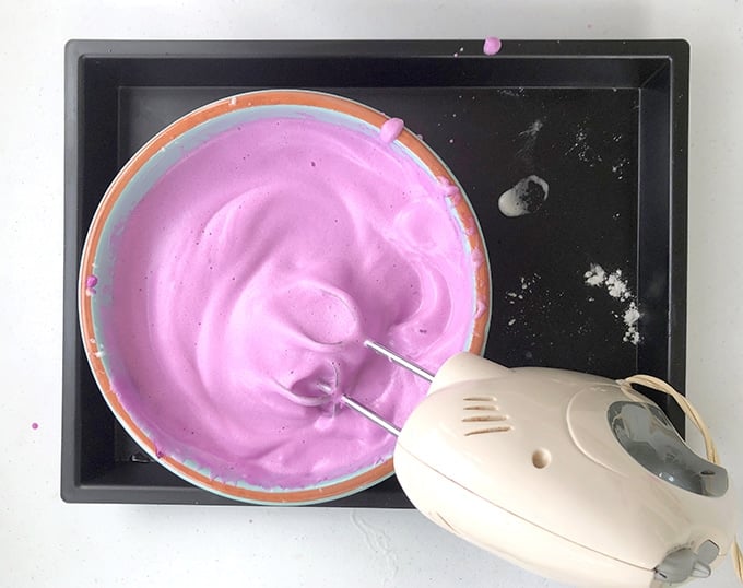whipping up aquafaba with mixer