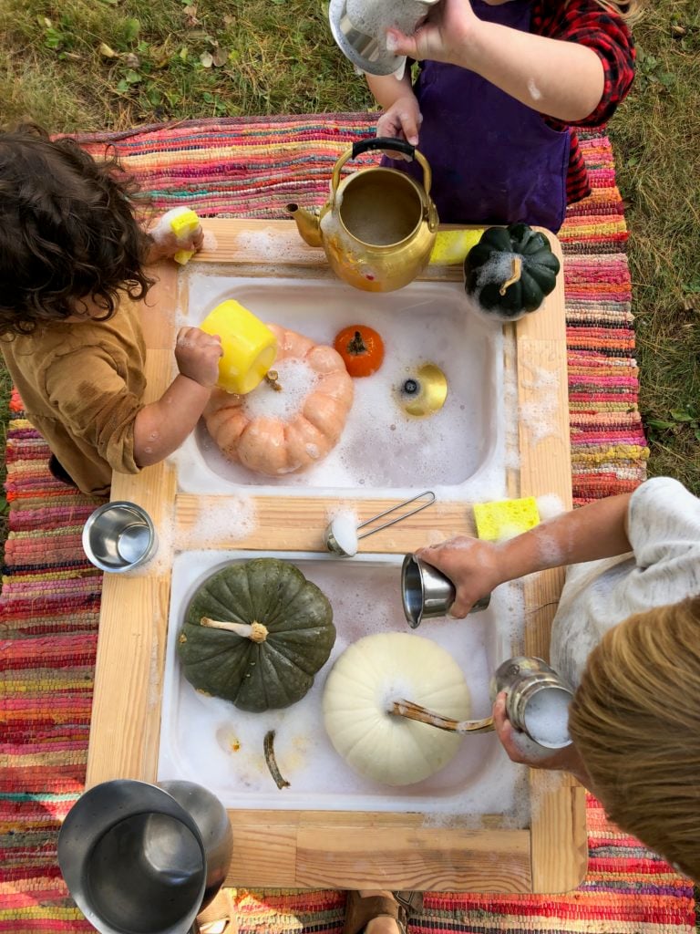 fall sensory bins for kids-washing guords