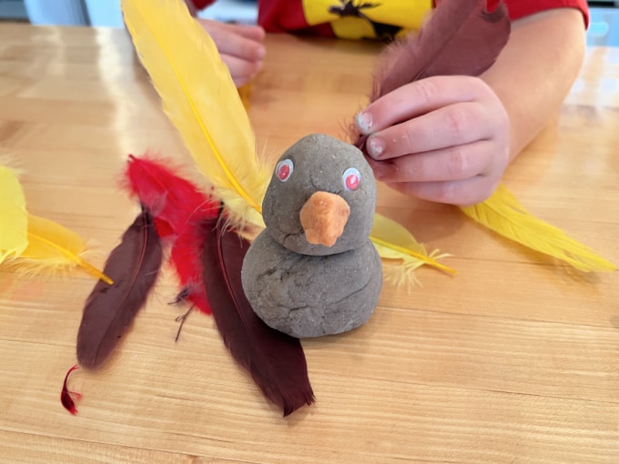 adding feathers to turkey