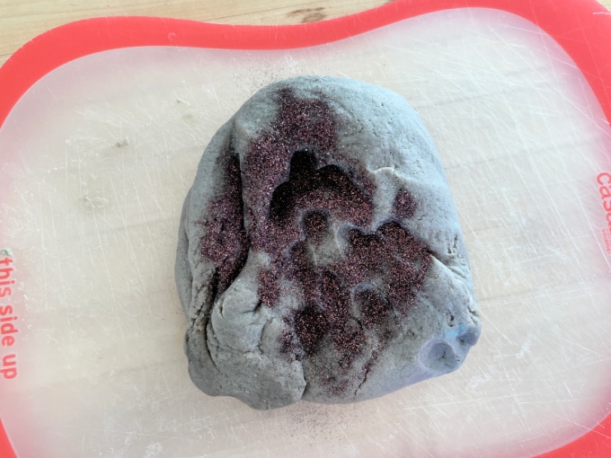 glitter on brown playdough
