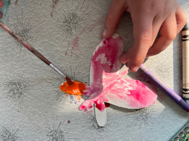 painting a paper butterfly
