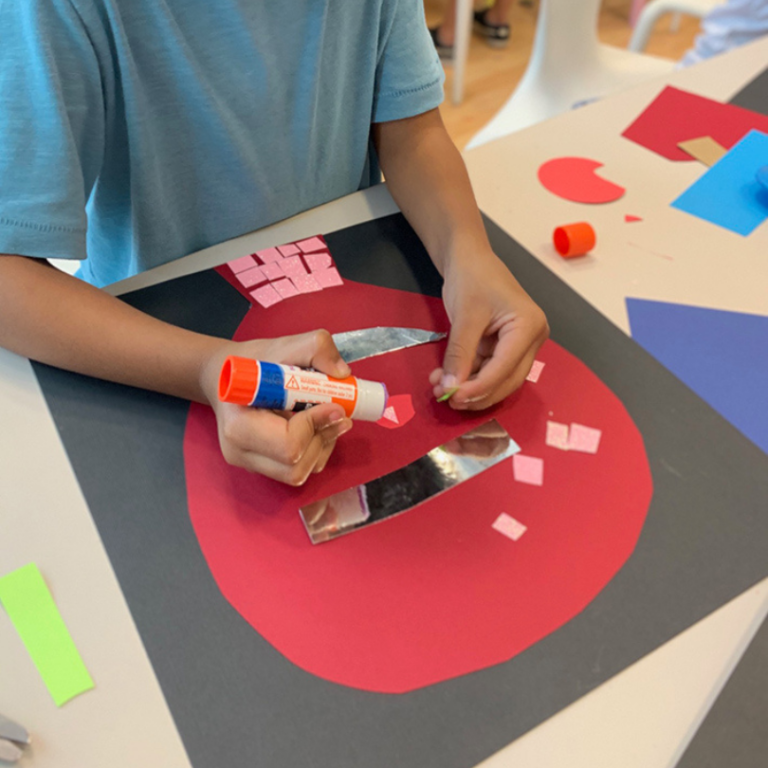 gluing collage pieces