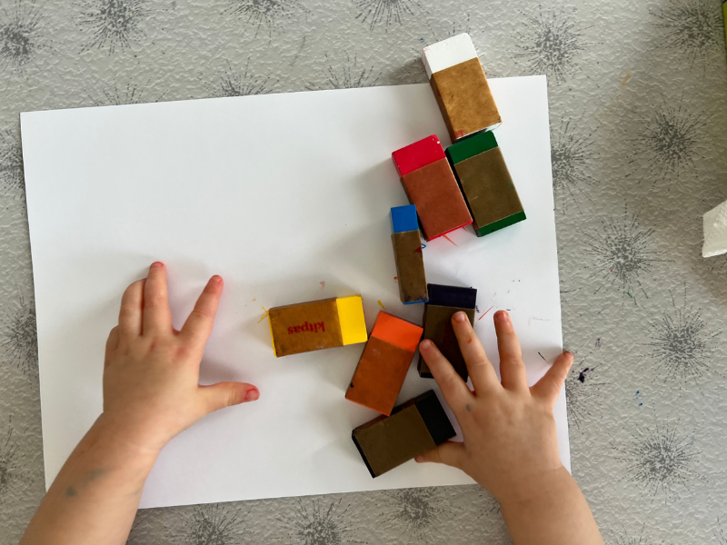 baby and crayons