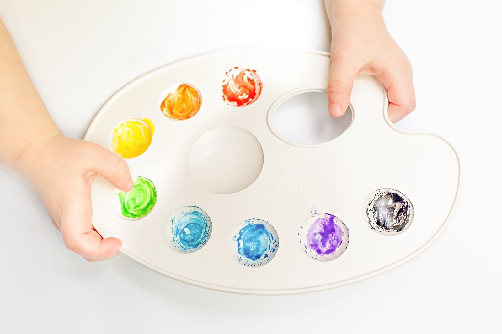 child finger painting tray