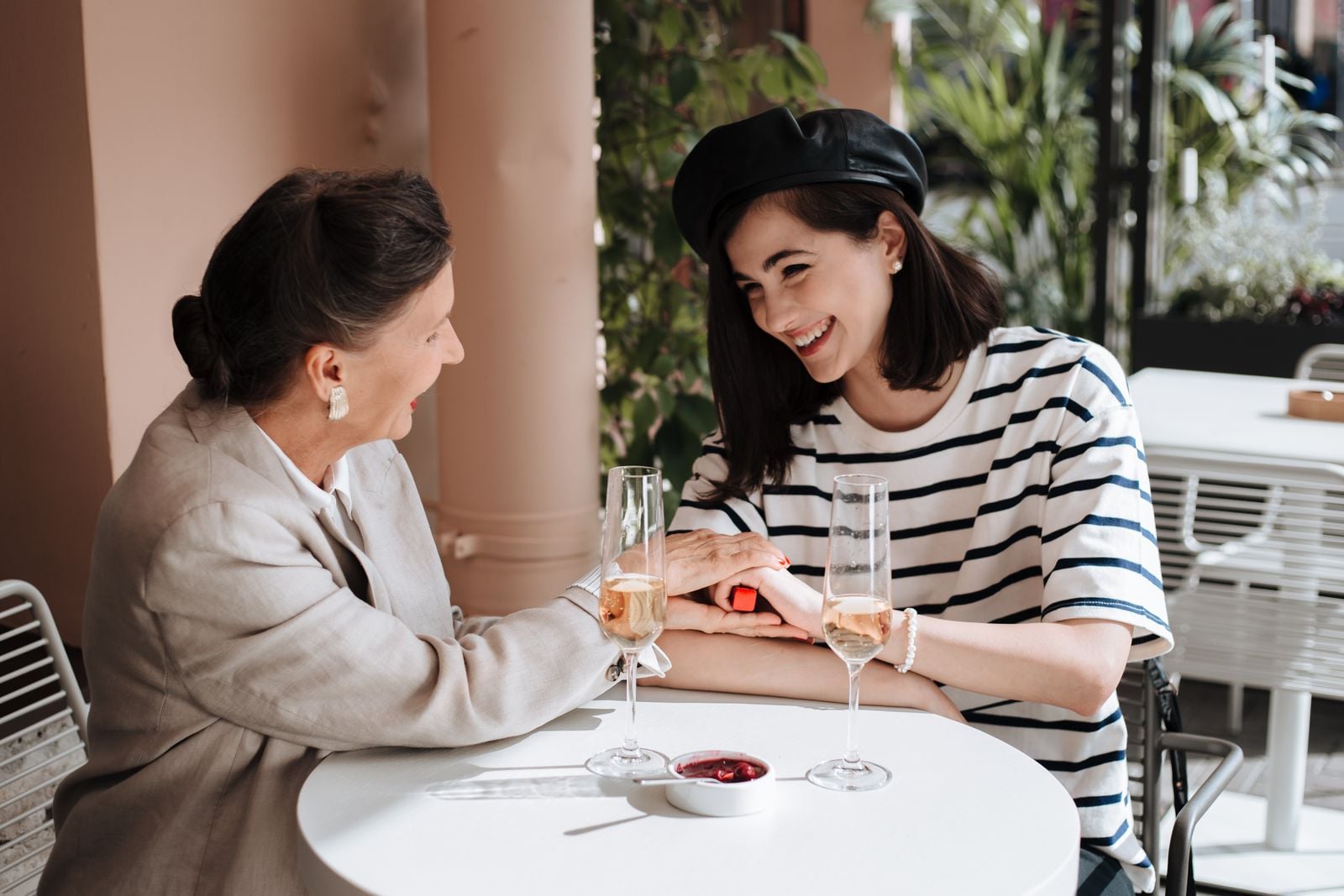 elderly mother daughter talking
