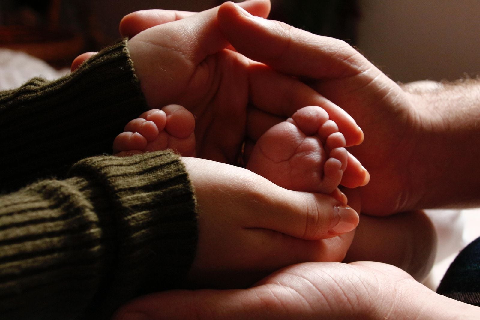 parent talking to infant