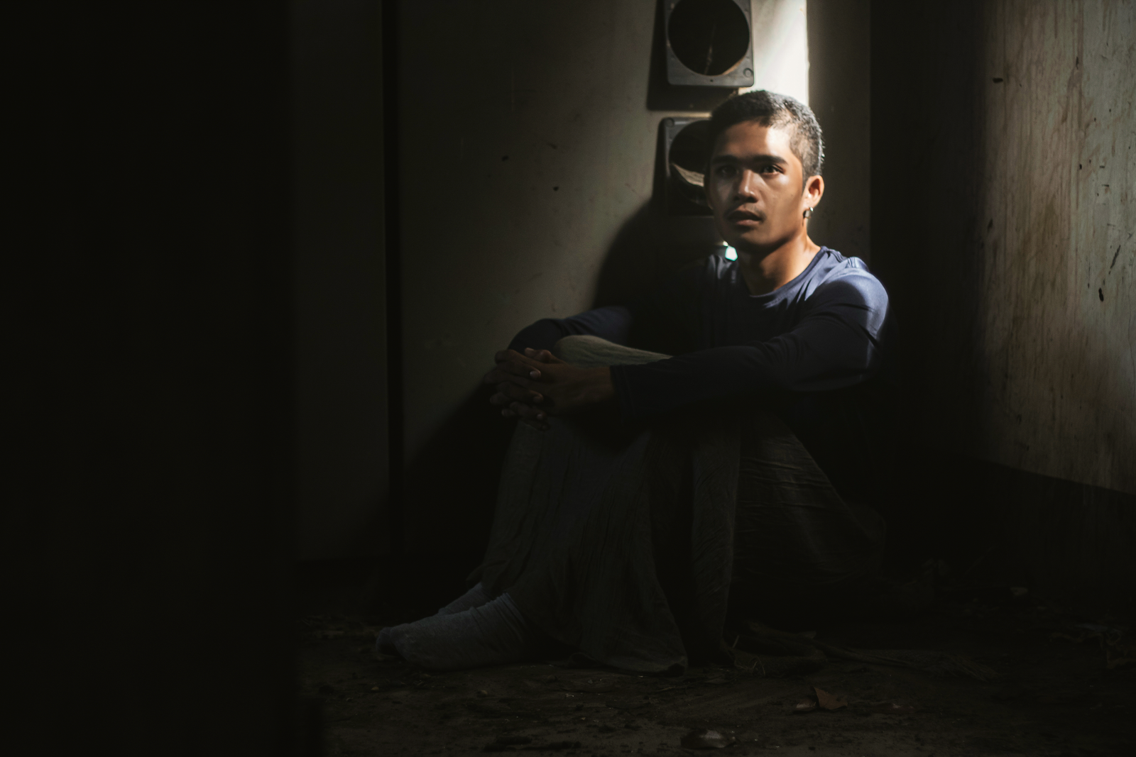 person alone dark room